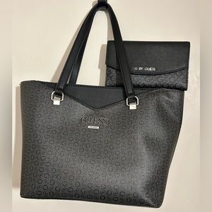 Guess Black Handbag and Large Wallet which has a zippered back pocket
